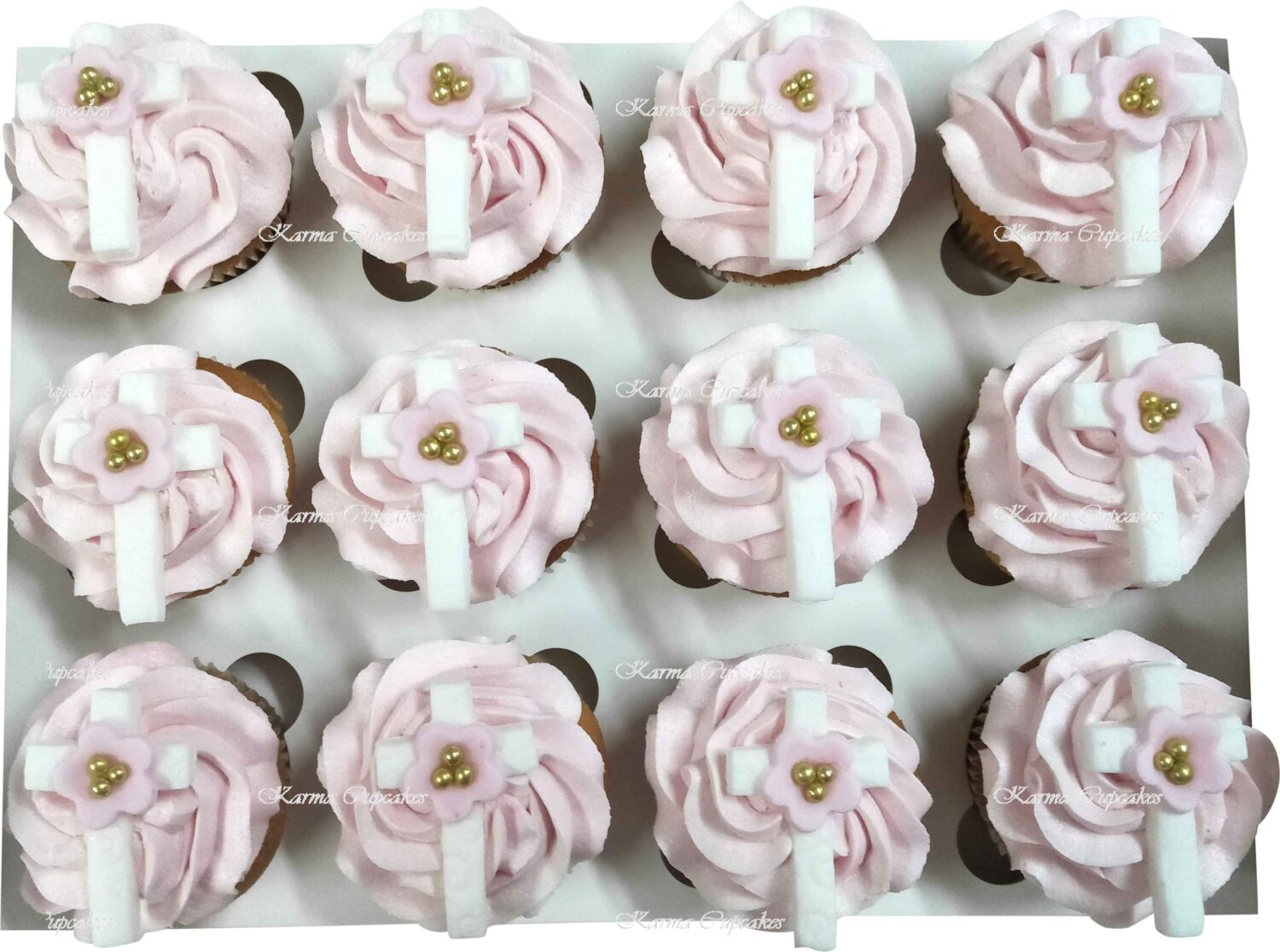 Pink baptism or christening cupcakes