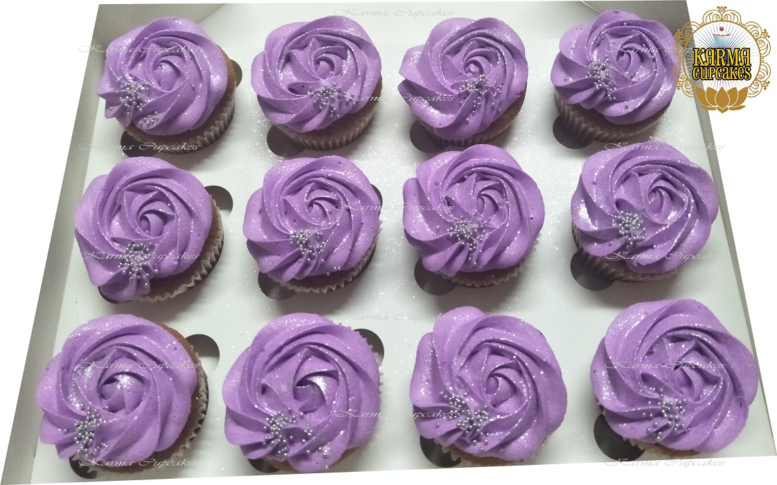 Women's Day themed purple rose swirl cupcakes