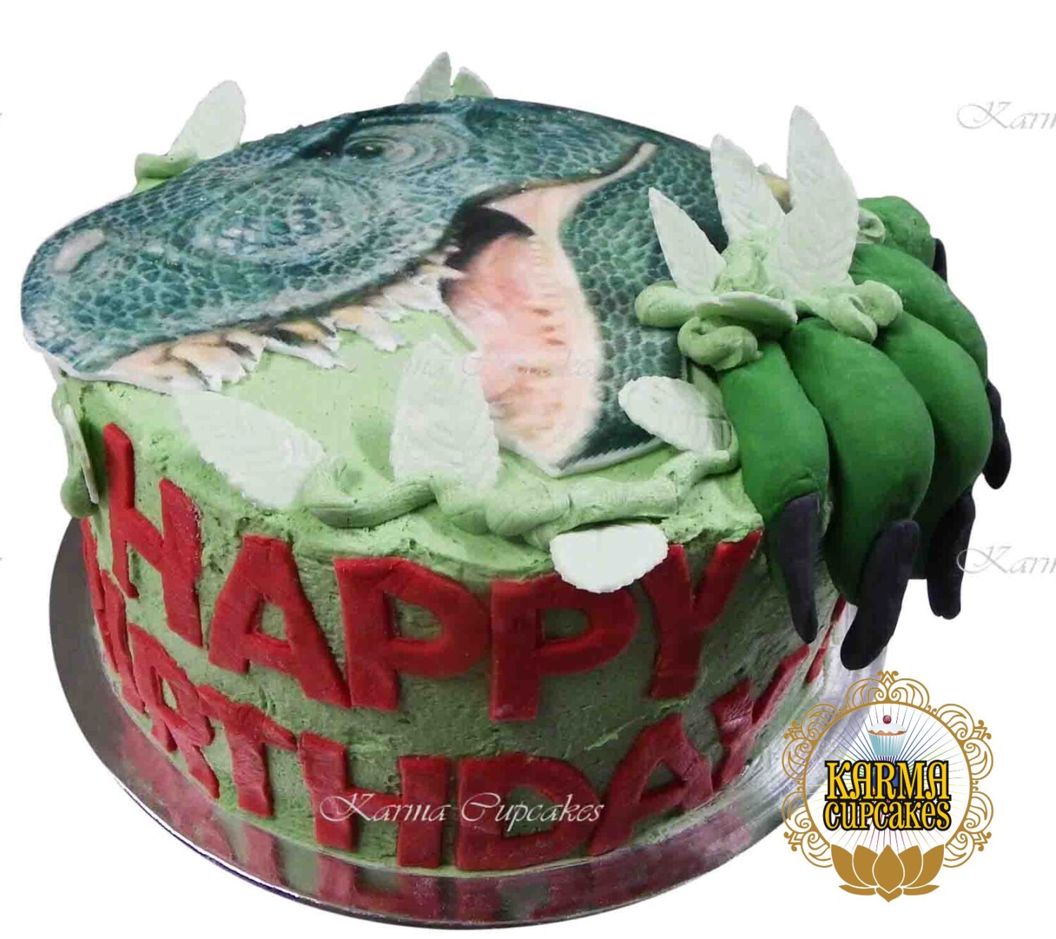 Dinosaur Cake buttercream iced with claw
