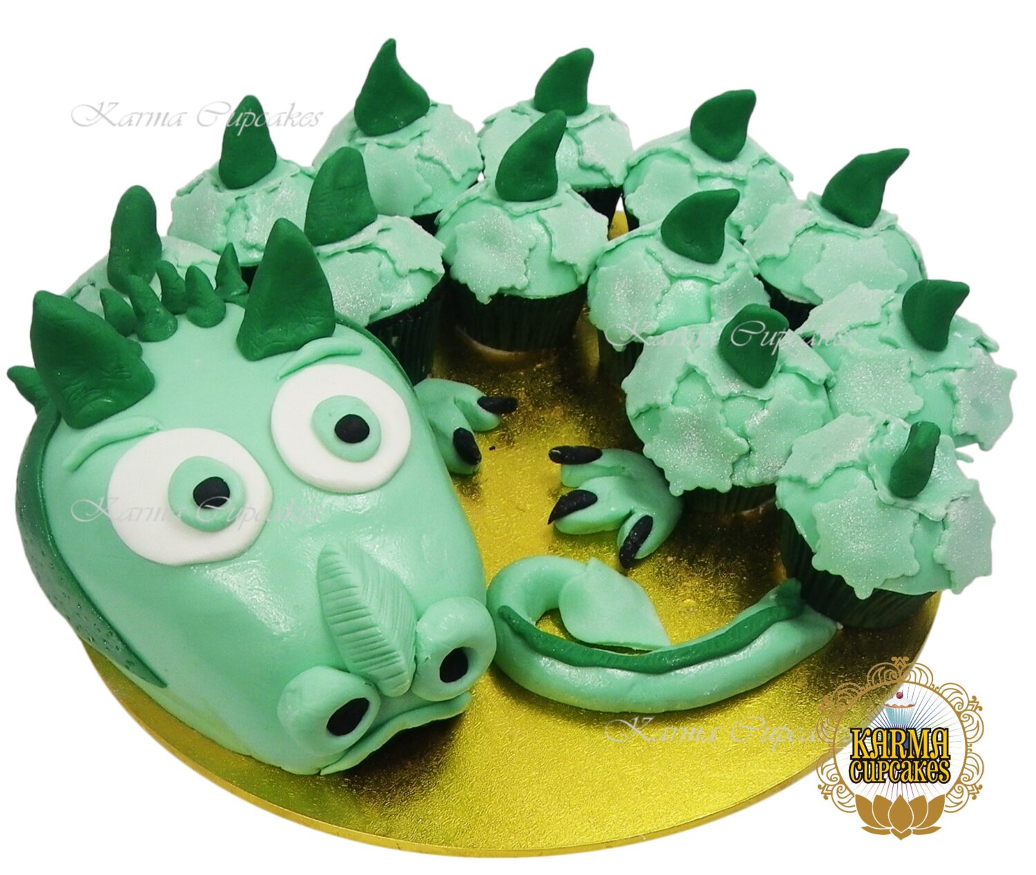 Dragon Cake head with 12 cupcakes as the body