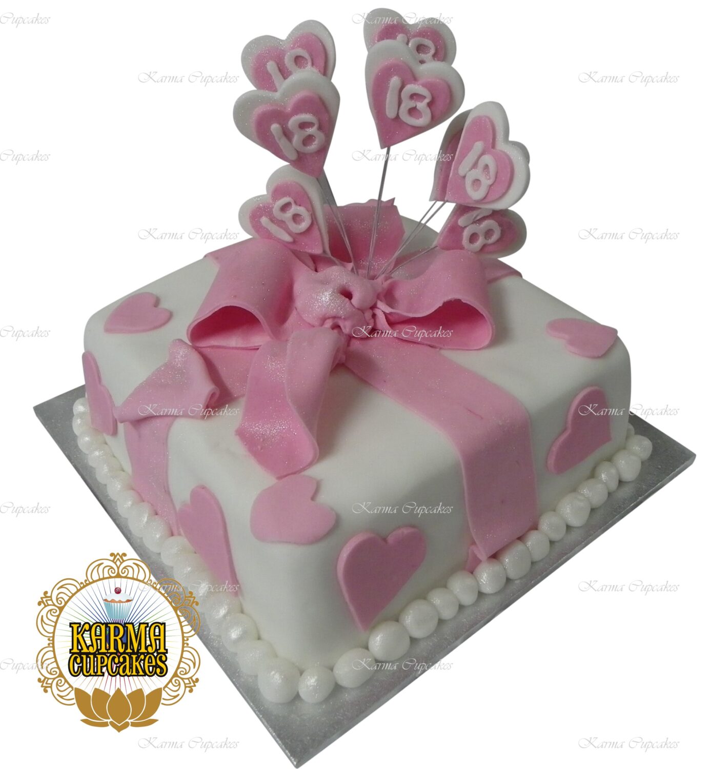 8" Pink/Purple Fondant iced present Cake with sugar bow & hearts