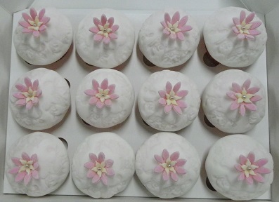 Embossed cupcakes with single handmade Pink Flower