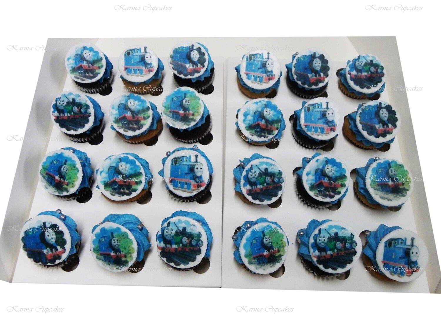 Thomas the Tank Engine Mini Cupcakes on blue buttercream icing